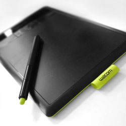 Ein Grafik-Tablet mit einem Stift: Moderne Technik für modernes Screendesign.